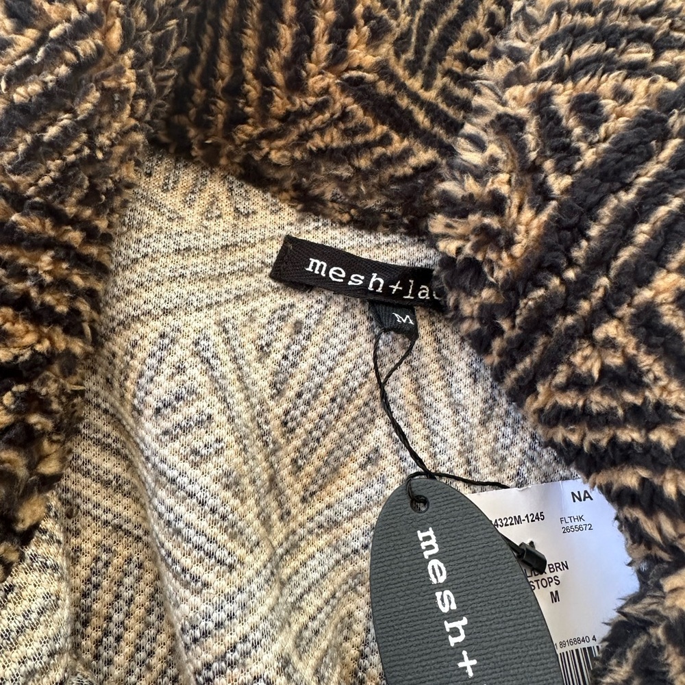 Brand new with tags pullover sweater.